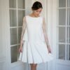 Atelier Camille - Robe courte blanche Balthazar. Robe de mariée manches longues dentelle et jupe corolle. Acheter en ligne et dans notre boutique à Paris