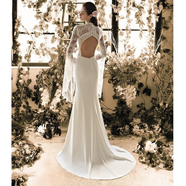 Robe de mariée longue Pia Metropolitan collection 2020. Robe boho chic tout en dentelle dans notre boutique mariage à Paris 11ème. Prendre un RDV