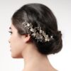 Accessoire de cheveux feuilles dorées et strass Poirier. Bijou de tête mariée doré feuilles, fleurs et strass. Acheter en ligne et boutique Paris