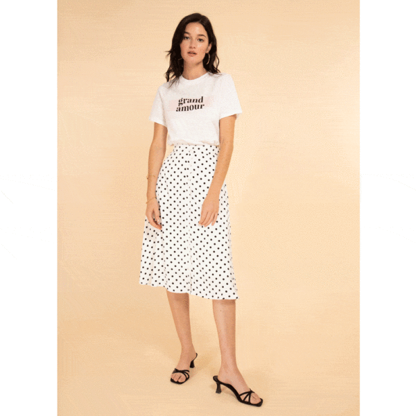 Jupe Jessy blanche à pois noirs longueur midi. Tenue témoin mariée couleur pastel pas chère. Acheter boutique mariage Paris et en ligne