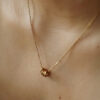 Collier Laura semainier doré à l'or fin par Kariboo. Bijou made in france plaqué or. Collier sept anneaux. Acheter boutique paris et en ligne