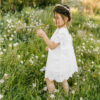 Robe fille Colette Les Petits Inclassables baptême cérémonie et cortège. Robe courte broderie pour communion. Dispo boutique Paris