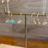 Boucles d'oreille trois pierres