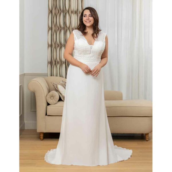 Robe de mariée longue Curvy Bohème en guipure collection 2023. Robe de mariée champêtre bohème. Essayer boutique mariage Paris