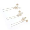 Pic à chignon de mariée fleurs de porcelaines. Accessoire de cheveux mariage. Achat en ligne ou boutique mariage paris coiffure