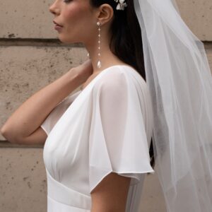 Peigne à chignon de mariée fleurs de porcelaines. Accessoire de cheveux mariage. Achat en ligne ou boutique mariage paris coiffure