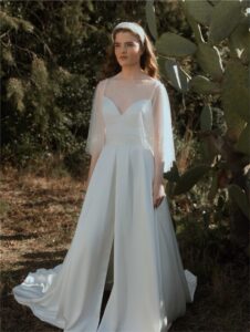 Cape avec perles blanc ivoire Poirier. Châle, boléro, étole, cape mariée blanche accessoire. Acheter boutique mariage Paris. En ligne.