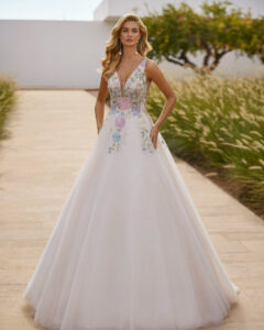 Robe de Mariée Shelly Adriana Alier 2026. Robe dentelle couleur pastel sans manche volume princesse. Essayer boutique mariage Paris