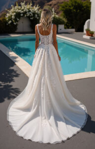 Robe de mariée Livie sans manches dentelle col carré et volume tulle. Mariage retro chic. Boutique Mariage essayer Paris showroom rdv